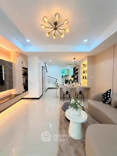 Modern living room with elegant lighting and stylish decor