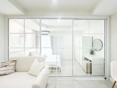 Bright and modern bedroom with sliding glass doors and elegant decor