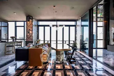 Luxurious modern living room with stunning city view and elegant decor