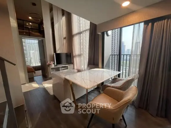 Luxurious modern living room with floor-to-ceiling windows and elegant decor