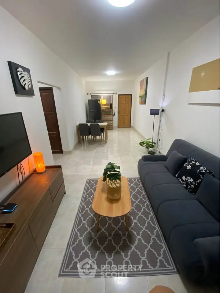 Spacious modern living room with stylish decor and open layout