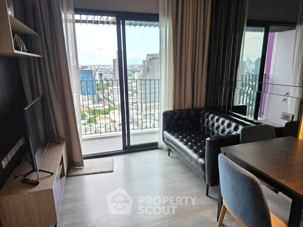 Modern living room with city view and stylish furniture in high-rise apartment