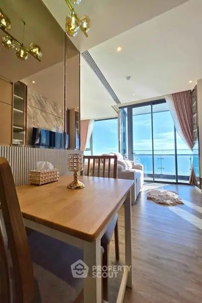 Luxurious living room with stunning ocean view and elegant decor