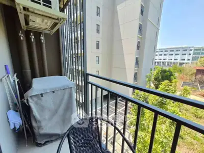 Charming balcony with city view, perfect for relaxation and enjoying the outdoors.