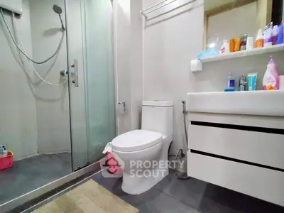 Modern bathroom with sleek shower and contemporary fixtures