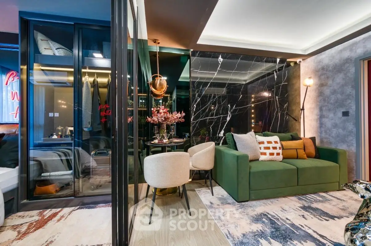Luxurious modern living room with green sofa and elegant decor