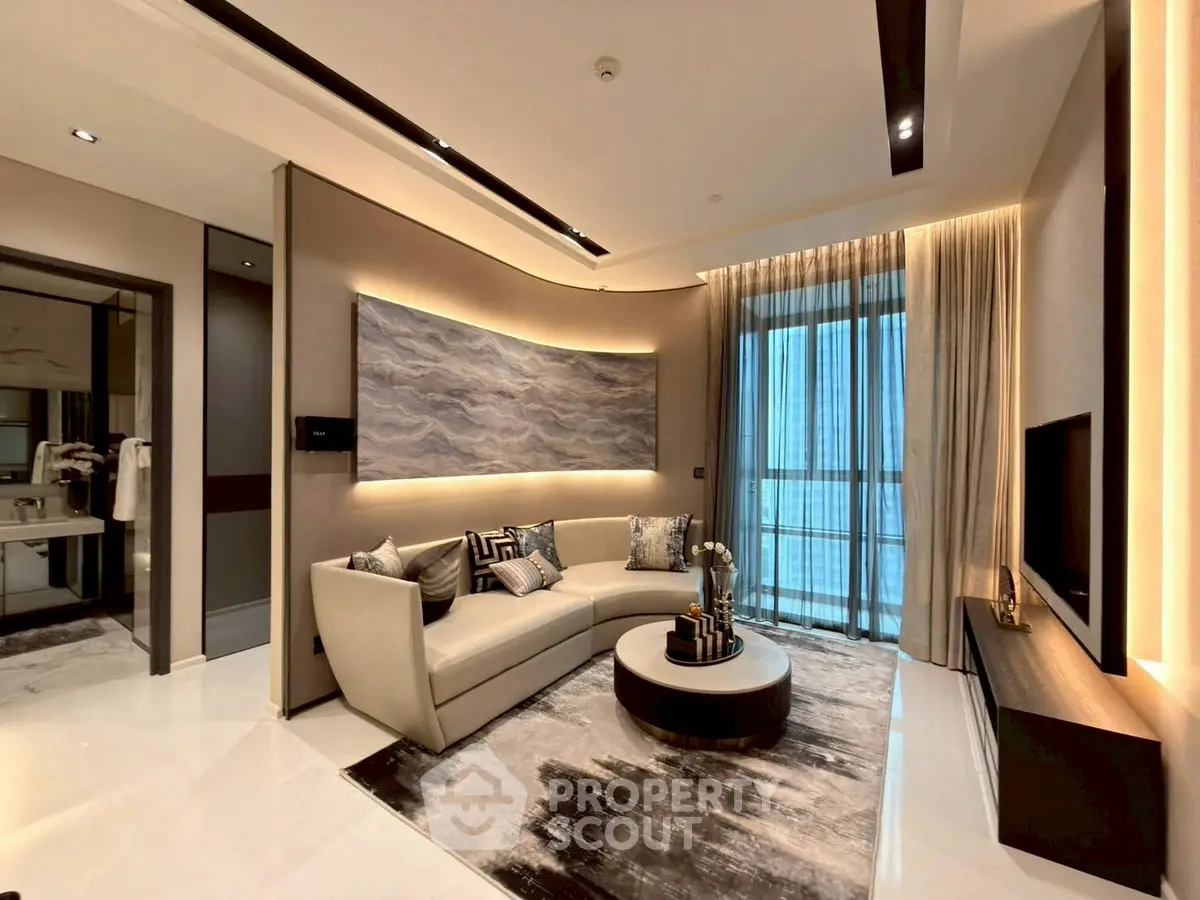 Luxurious modern living room with elegant decor and large windows