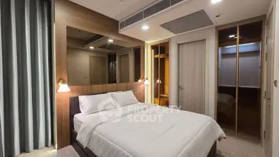 Modern bedroom with cozy lighting and elegant decor