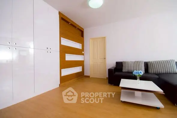 Spacious modern living room with sleek design and stylish furniture