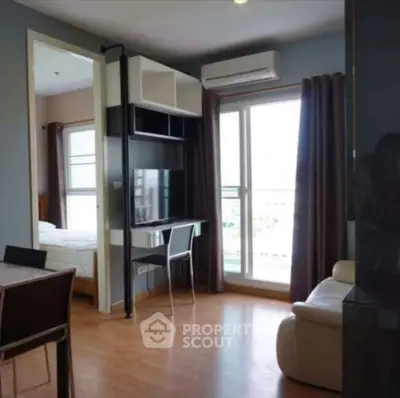 Modern apartment interior with open layout and balcony view