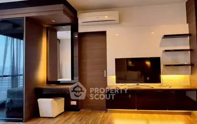 Modern living room with sleek wooden furniture and mounted TV, featuring ambient lighting and air conditioning.