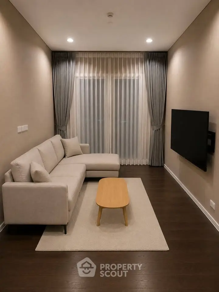 Modern living room with sleek design, featuring a cozy sofa, elegant curtains, and a wall-mounted TV.