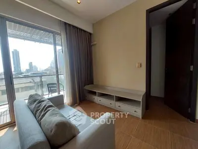 Modern living room with balcony view in urban apartment