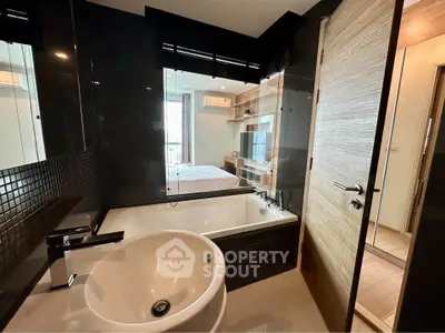Modern bathroom with sleek design and bathtub in luxury apartment