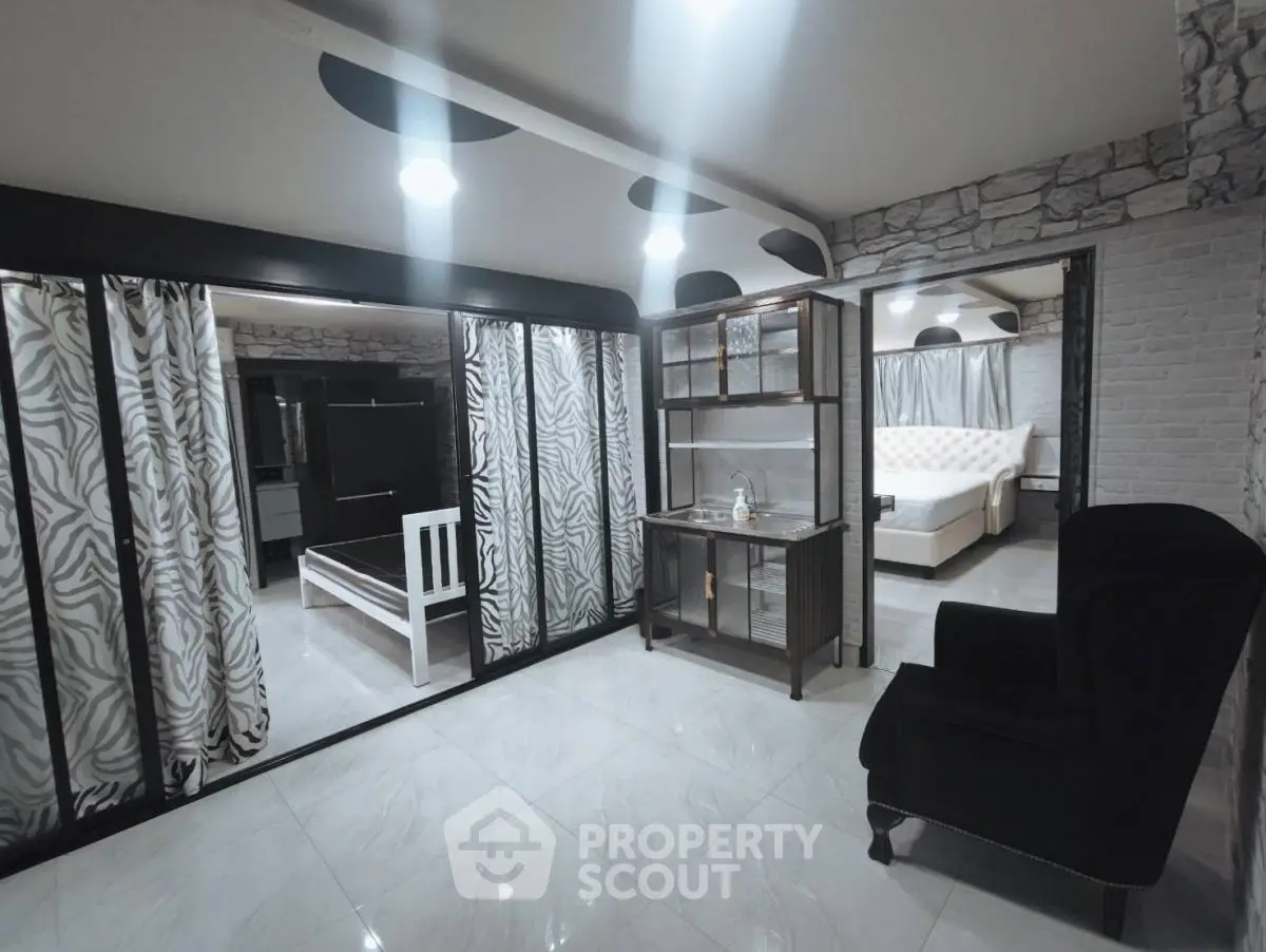 Spacious modern living area with stylish decor and elegant furnishings