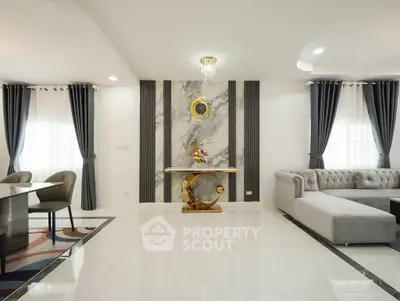 Luxurious modern living room with elegant decor and plush seating