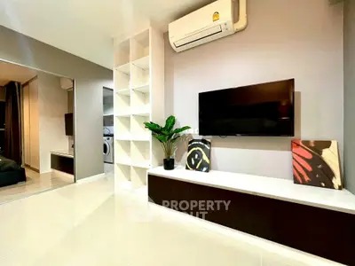 Modern living room with sleek TV setup and stylish decor