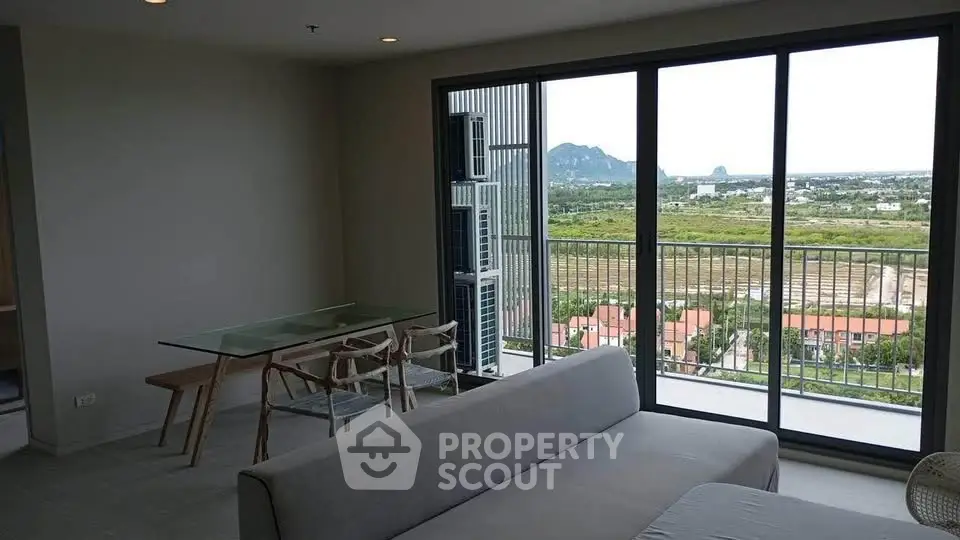 Modern living room with panoramic view and stylish furniture