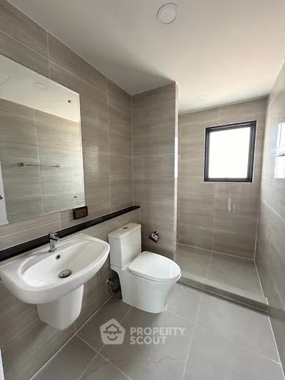 Modern bathroom with sleek fixtures and natural light