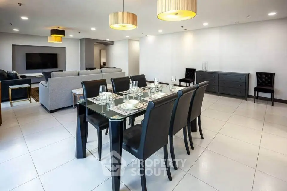 Spacious modern living room with elegant dining area and stylish furniture