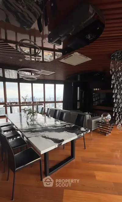 Luxurious modern living room with panoramic city views and elegant dining area.