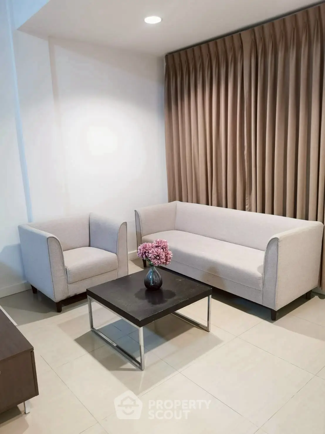 Modern living room with elegant sofa set and stylish coffee table