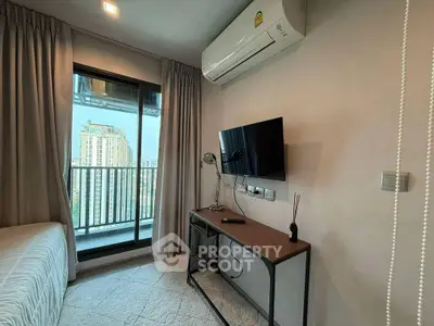 Modern bedroom with balcony view in urban apartment