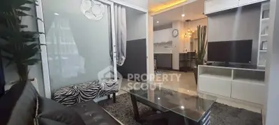 Modern living room with stylish decor and open kitchen layout