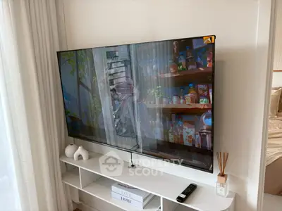Modern living room with sleek TV setup and stylish decor