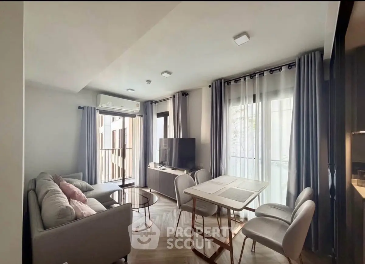 Modern living room with stylish furniture and natural light