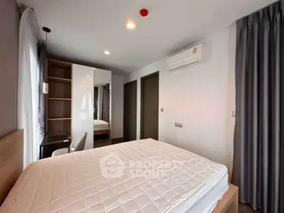 Modern bedroom with air conditioning and stylish decor