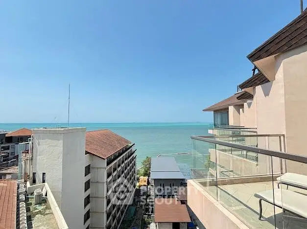 Stunning ocean view from a modern balcony in a high-rise building, perfect for relaxation and enjoying sunsets.