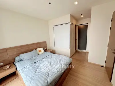 Cozy bedroom with modern wooden furniture and soft lighting