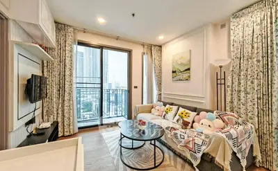 Charming living room with balcony view in modern apartment