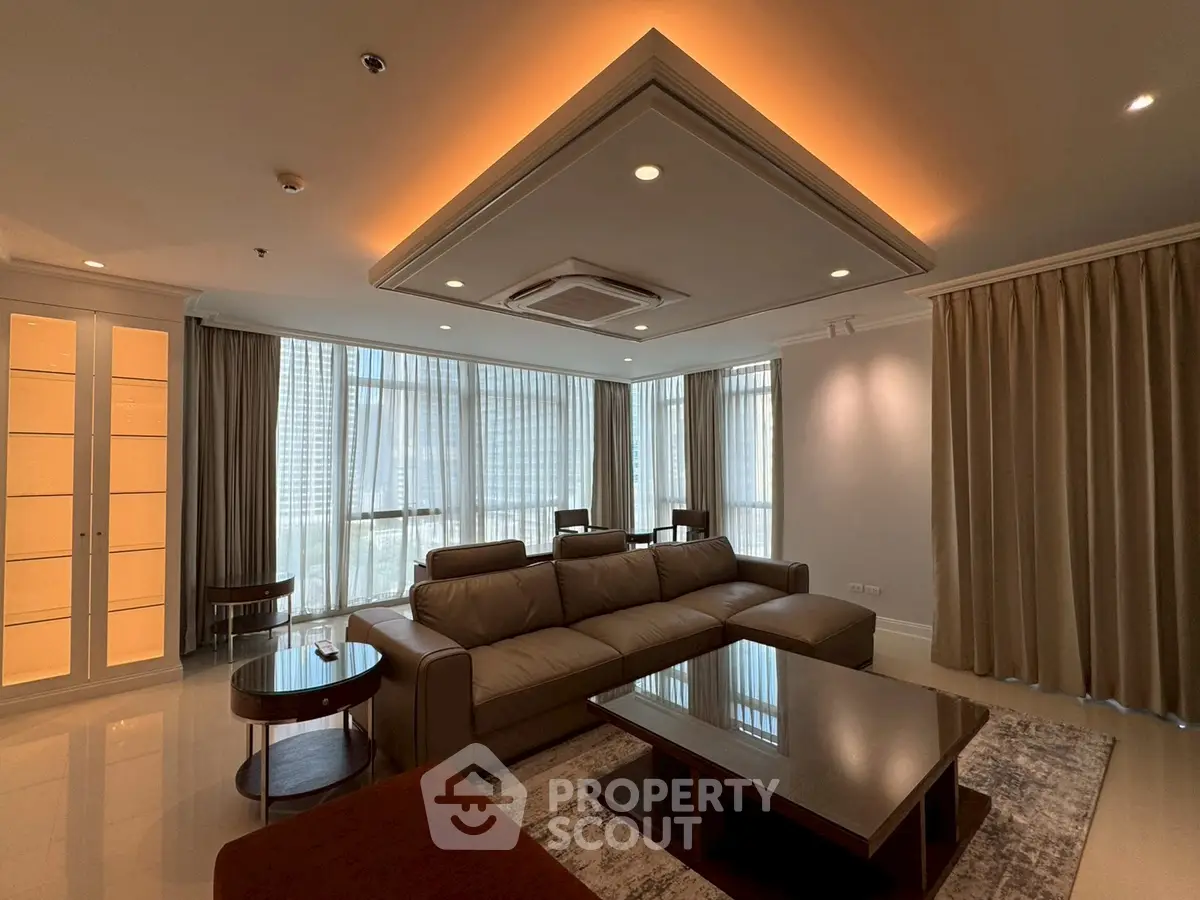 Luxurious living room with modern furniture and ambient lighting in a high-end apartment.