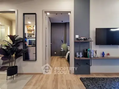 Modern apartment interior with stylish decor and open view into bedroom