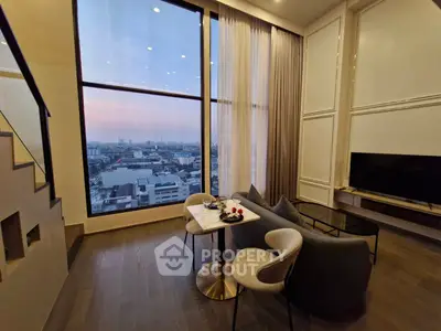 Stunning high-rise living room with panoramic city view and elegant decor