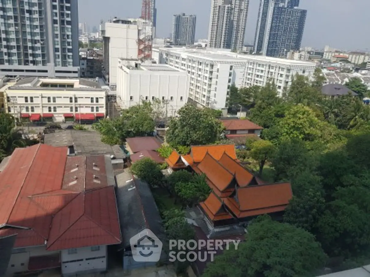 Stunning cityscape view with modern high-rises and traditional architecture, perfect for urban living enthusiasts.