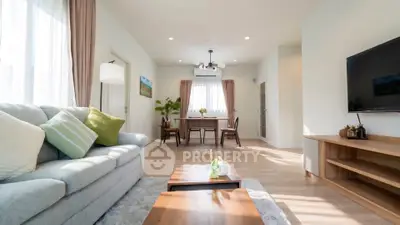 Spacious and bright living room with modern decor and natural light