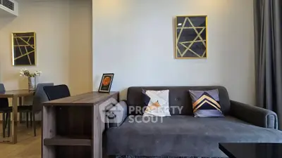 Modern living room with stylish decor and comfortable seating in a contemporary apartment.