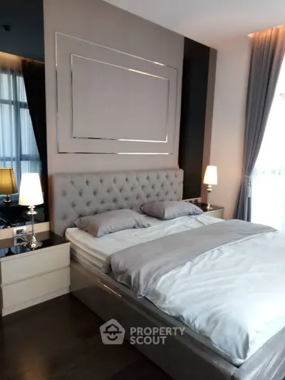 Luxurious modern bedroom with elegant decor and plush bedding