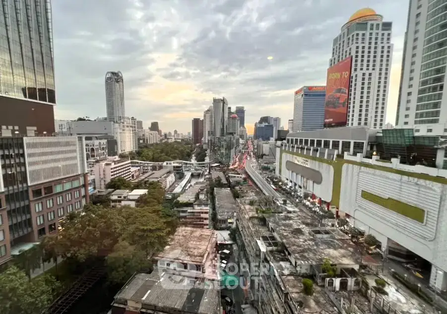 Stunning cityscape view from high-rise building showcasing urban skyline and vibrant city life.