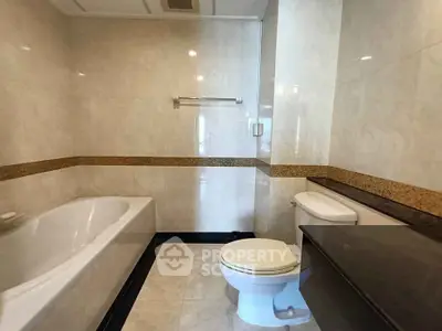 Luxurious bathroom with elegant bathtub and modern fixtures