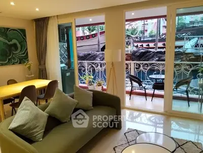 Stylish living room with balcony view in modern apartment