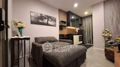 Modern living room with open kitchen and cozy decor