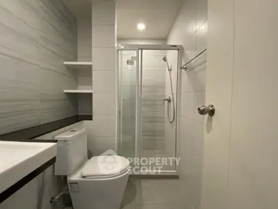 Modern bathroom with sleek shower and contemporary fixtures