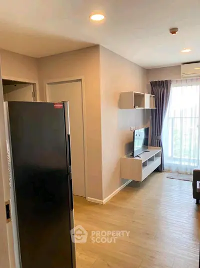 Modern living room with sleek design and natural light