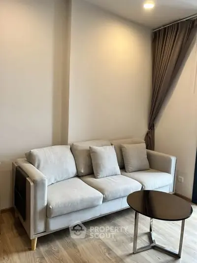 Modern living room with cozy sofa and elegant decor