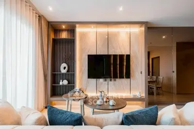 Luxurious modern living room with elegant decor and cozy seating area.