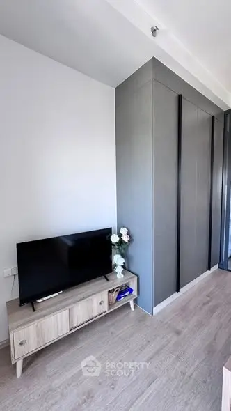Modern living room with sleek TV stand and minimalist decor